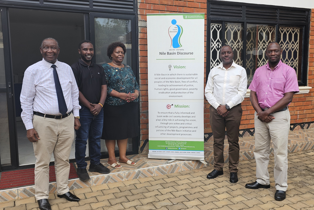 Andrew Aijuka with the NBD team at Entebbe