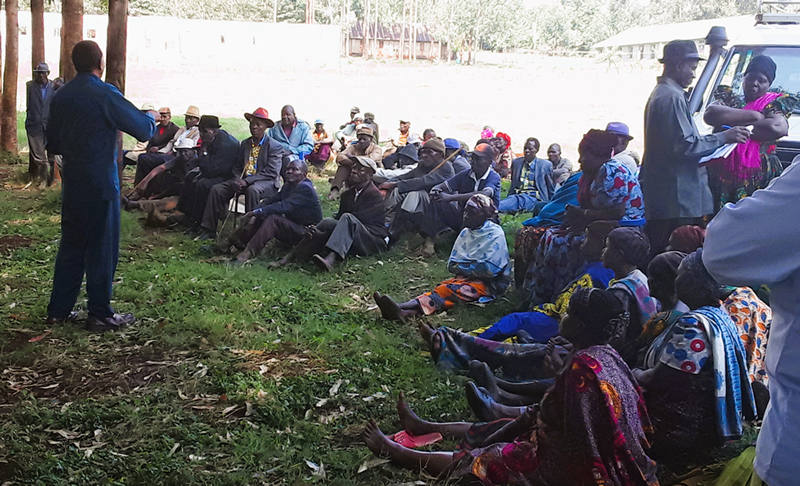 A SHIMATA official addresses participants of one of the village meetings that were held to plan for implementation of the project A SHIMATA official addresses participants of one of the village meetings that were held to plan for implementation of the project